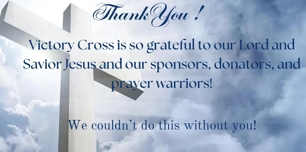 A thank you note is posted on the side of a cross.